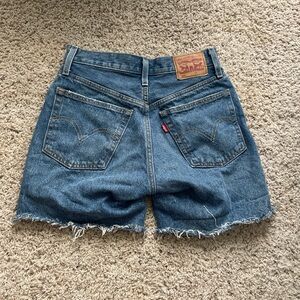Dark wash Levi’s 501 women’s shorts